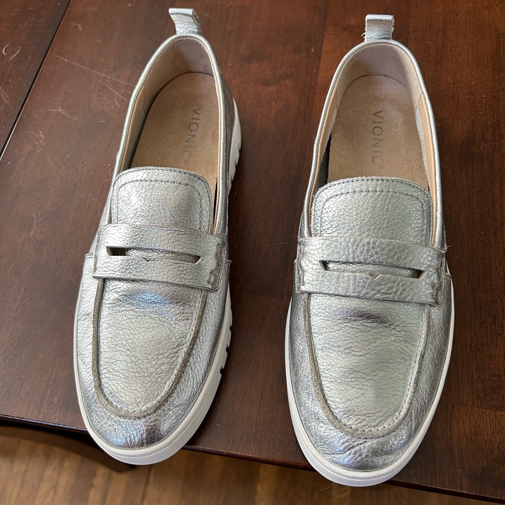 Silver Vionic Uptown loafers.
